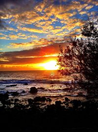 Scenic view of sea at sunset