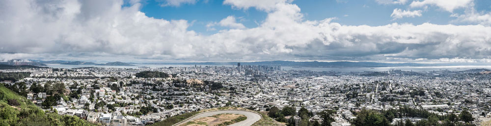 Panoramic shot of cityscape against sky