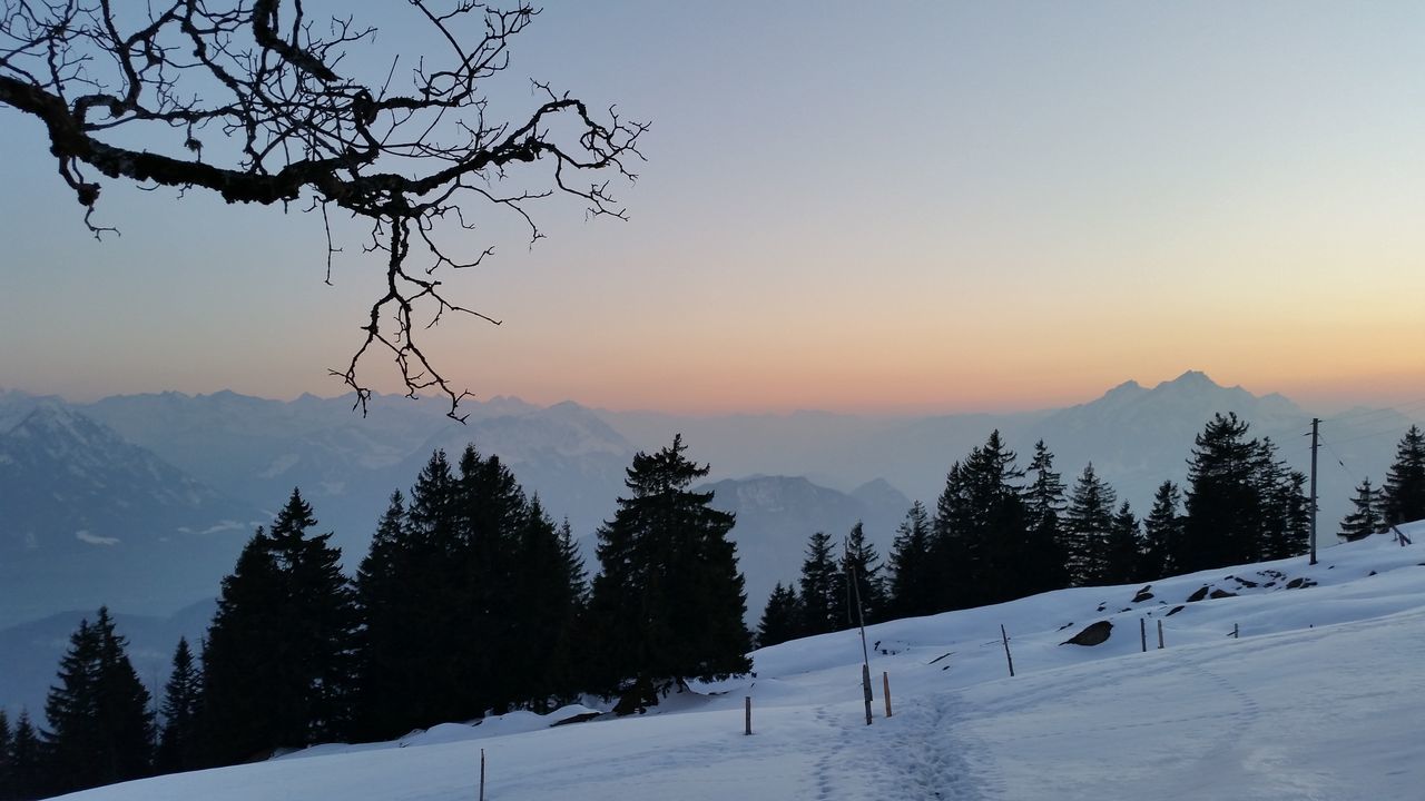 snow, winter, cold temperature, season, tranquil scene, weather, tranquility, sunset, scenics, beauty in nature, landscape, covering, tree, nature, mountain, sky, frozen, non-urban scene, bare tree, mountain range