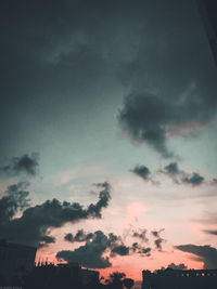 Low angle view of dramatic sky during sunset