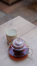 High angle view of coffee cup on table