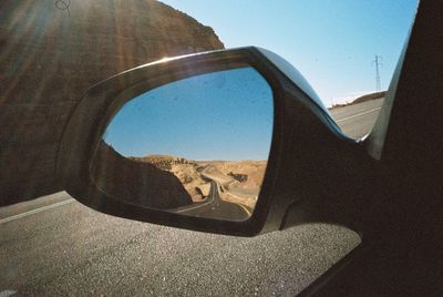 Reflection of sky on car window
