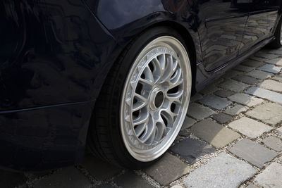 Close-up of car on street