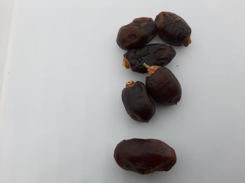 High angle view of blackberries against white background