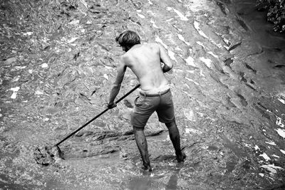 High angle view of man working at seine river