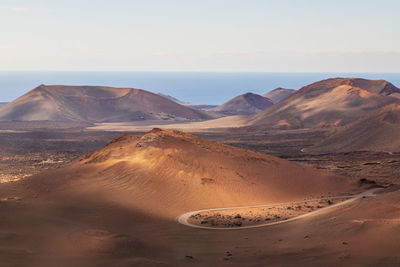 Scenic view of desert against sky