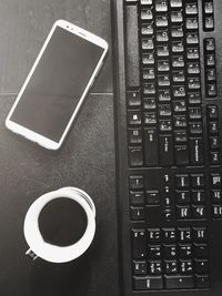 High angle view of coffee cup on table