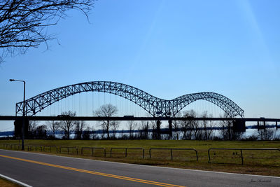 View of bridge against clear blue sky