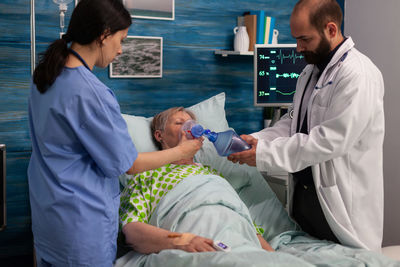 Doctor examining patient at clinic