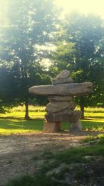 Statue against trees