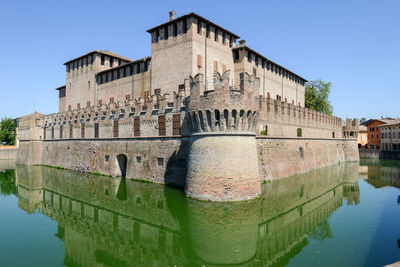 Reflection of building in lake