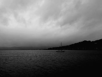 Scenic view of sea against sky at dusk