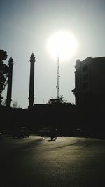 Sun shining through buildings
