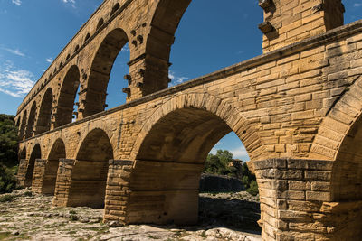 Low angle view of historical building pont du gard