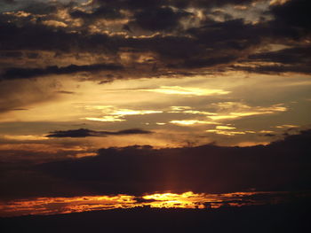 Scenic view of dramatic sky during sunset