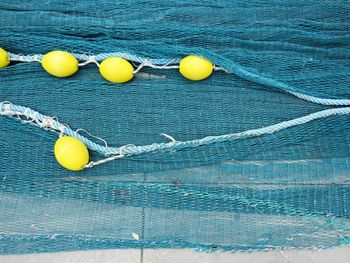 High angle view of yellow ball in swimming pool