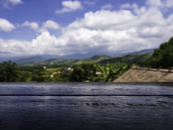 Surface level of lake against sky