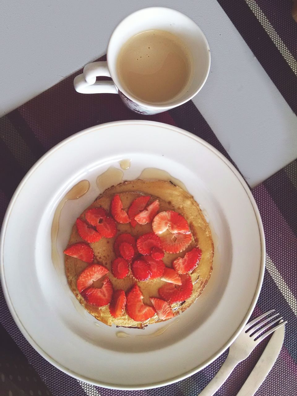 food and drink, freshness, food, indoors, plate, table, healthy eating, still life, red, high angle view, drink, breakfast, ready-to-eat, spoon, bowl, directly above, refreshment, fruit, coffee cup, coffee - drink