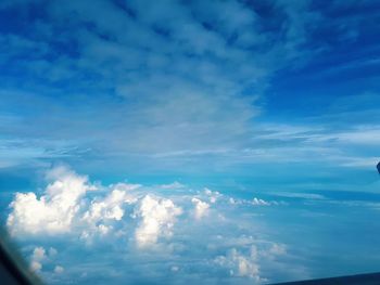 Low angle view of cloudscape against blue sky