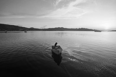 Lonely single boat on calm lake