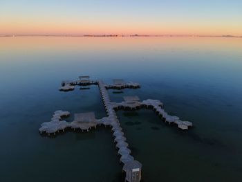 High angle view of sea against sky during sunset