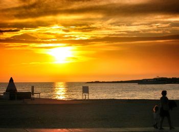 Scenic view of sea at sunset