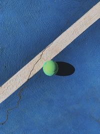 High angle view of green ball on bed