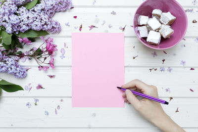 Close-up of paper flowers on table