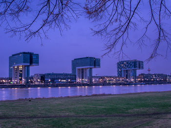 Illuminated buildings in city at night