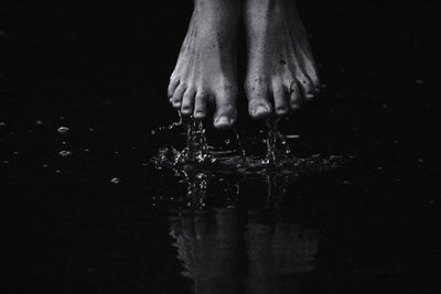 Feet over water