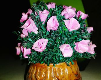 Close-up of pink flowers on table