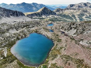 High angle view of lake against mountain range