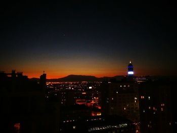 High angle view of illuminated cityscape