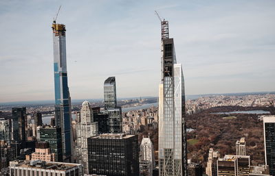 Modern buildings in city against sky