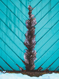 Garage door rotten wood green blue turquoise