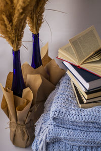 Close-up of books on table at home