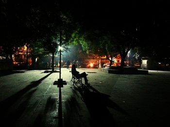 Illuminated street lights at night