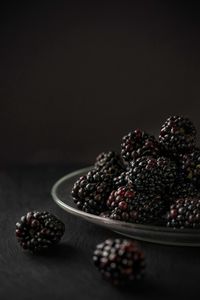 Close-up of fruits in plate on table