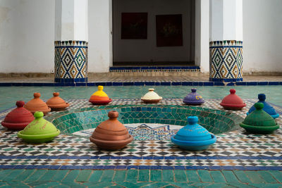 Multi colored umbrellas on floor