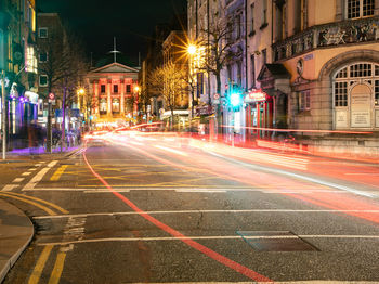 Light trails on city street at night