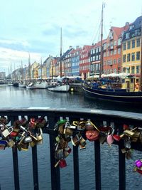 Close-up of padlocks on bridge