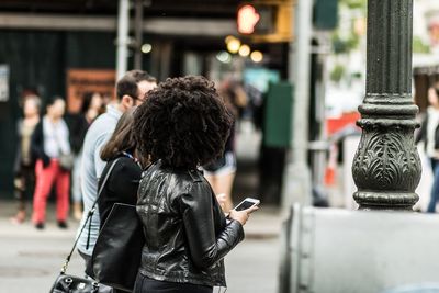 Young woman using mobile phone