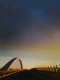 View of bridge against cloudy sky