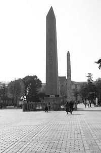 Tourists in front of historic building