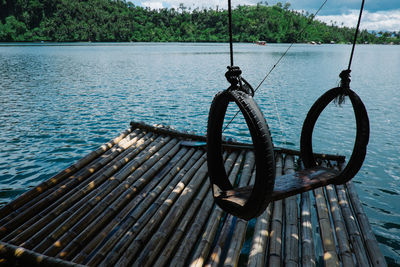 Boat sailing on jetty by sea