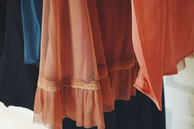 Close-up of clothes hanging at home