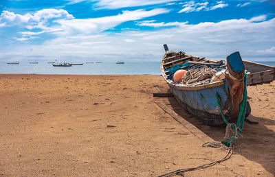 Fishing boat missions on the beach. this boat is located on the tropical keta ghana west africa