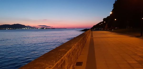 Scenic view of sea against sky at sunset