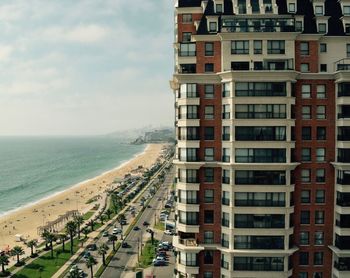 Panoramic view of beach against sky in city