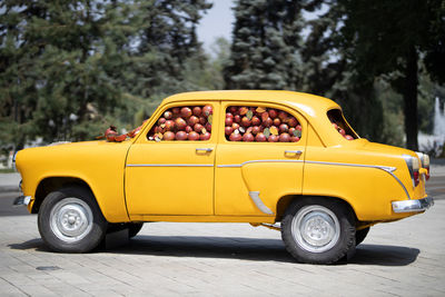 Street art - car full of fruits.